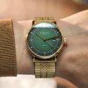 STERNGLAS Naos 38 Solaruhr grün vergoldet Metallband